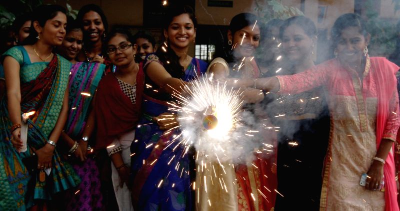 College students celebrate Diwali in Chennai on Oct 28, 2016.