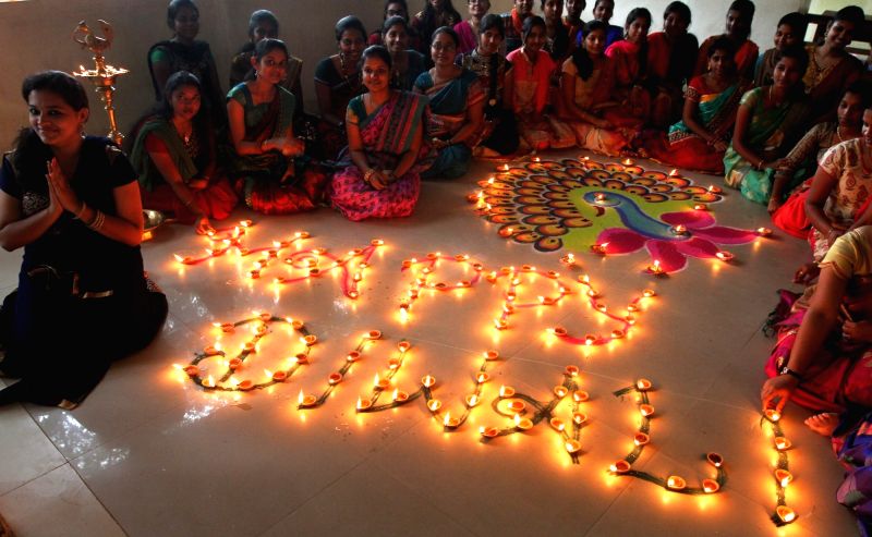 College students celebrate Diwali in Chennai on Oct 28, 2016.