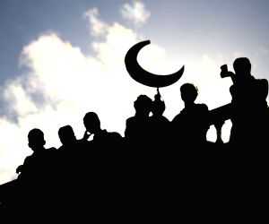 KATHMANDU, July 7, 2016 - Nepalese Muslims wait for a mass prayer on the Eid al-Fitr festival at Kashmiri Mosque in Kathmandu, Nepal, July 7, 2016. Eid al-Fitr festival marks the end of the Islamic ...